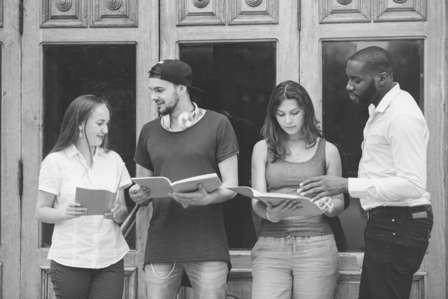 Professional trader analyzing multiple investment calendars and market timing data